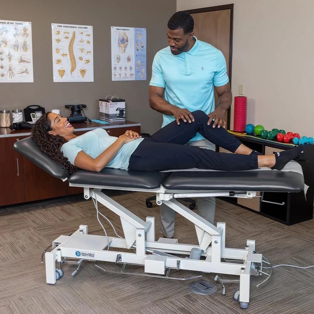 BodyMed 3 Section Hi-Lo Treatment Table, Black, 77 in. x 27 in. x 18–36 in. – Durable, Adjustable Physical Therapy Table – ADA Compliant – Bar Activated Elevation – Foam Padding & Vinyl Upholstery